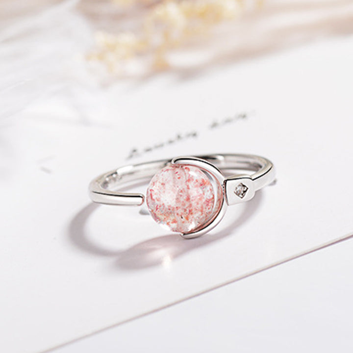 Anillo de rotación calmante de cristal rosa con Buddha Stones