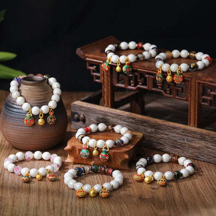 Pulsera de la suerte con cuentas de porcelana coloridas de cristal Liuli con Buddha Stones que tragan oro y bestia familiar