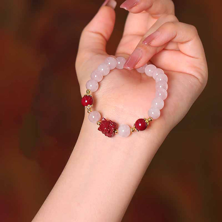 Pulsera de amor de zorro de nueve colas de cinabrio de cristal rosa natural con Buddha Stones