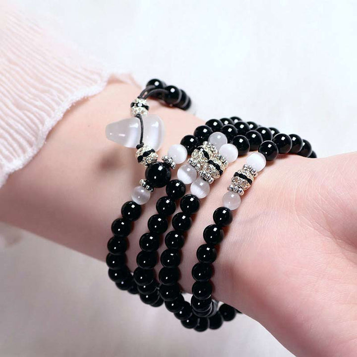 Pulsera de meditación con cuentas de cristal blanco de ónix negro