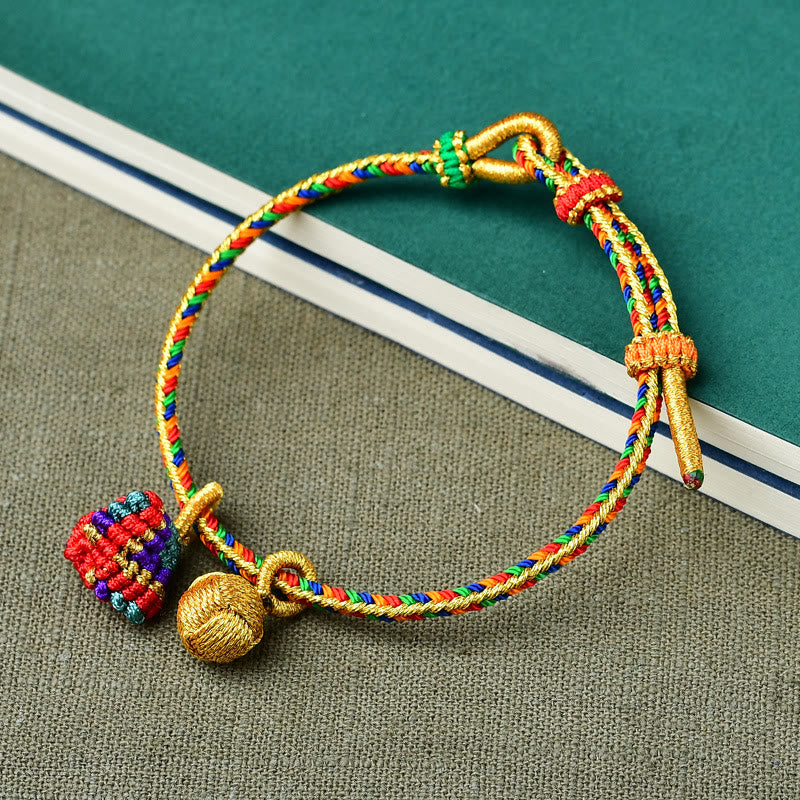 Pulsera con dije de bola dorada Zongzi hecha a mano con cuerda colorida y Buddha Stones
