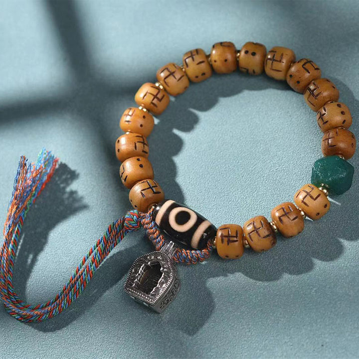 Buddha Stones, hueso de camello tibetano Natural, esvástica, cuentas Dzi, amuleto de Buda Shankha, Kirtimukha, pulsera con borla de protección de la suerte