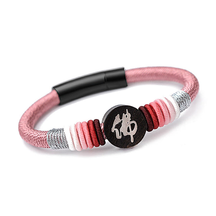 Pulsera de cuerda hecha a mano de ébano con personaje de Buda de Buddha Stones