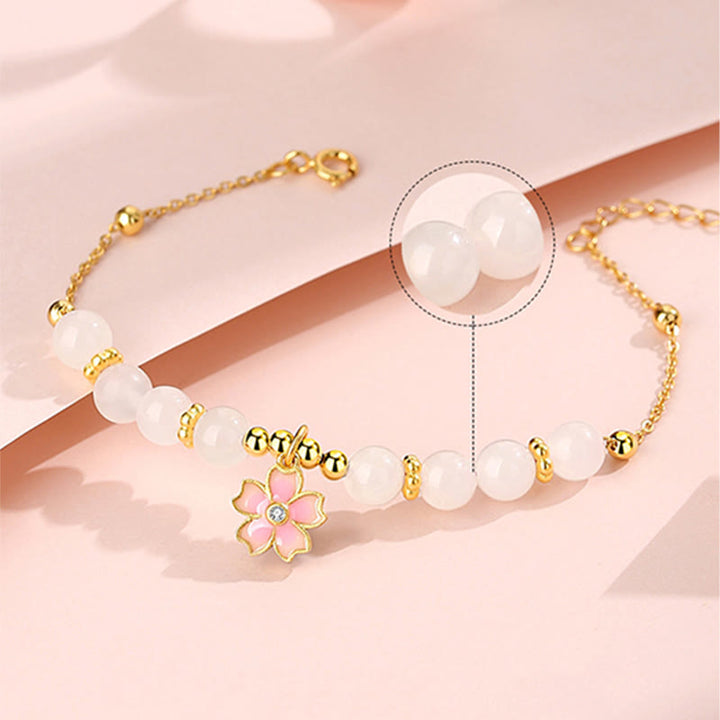 Pulsera de protección de flor de cerezo de jade blanco hetiano de plata de ley 925 con Buddha Stones