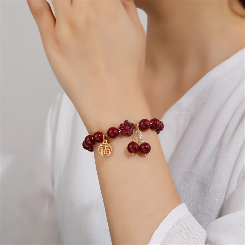 Pulsera de bendición de flor de cerezo con personaje de cinabrio de Buddha Stones