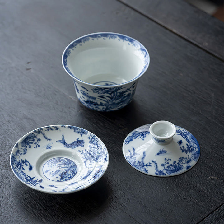 Buddha Stones Porcelana Azul Y Blanca Loto Pez Koi Danza Del León Sandía Cerámica Gaiwan Sancai Taza De Té Kung Fu Taza De Té Y Platillo Con Tapa 300ml