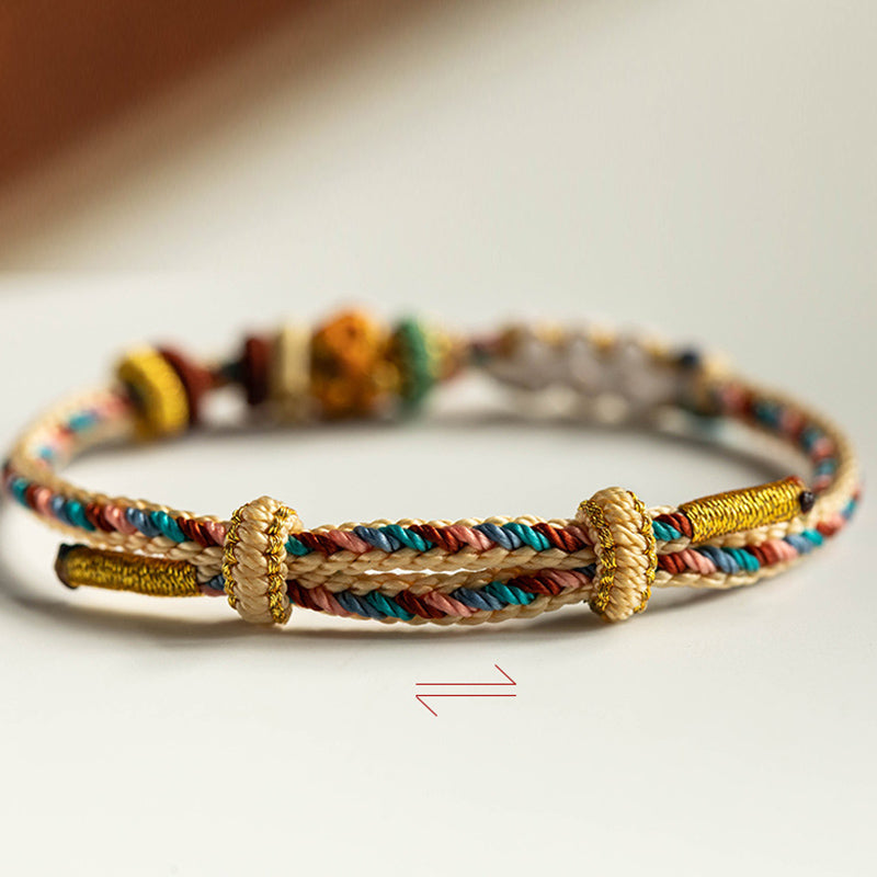Pulsera de hilo trenzado con diseño de flor de melocotón de color Dunhuang hecha a mano con Buddha Stones