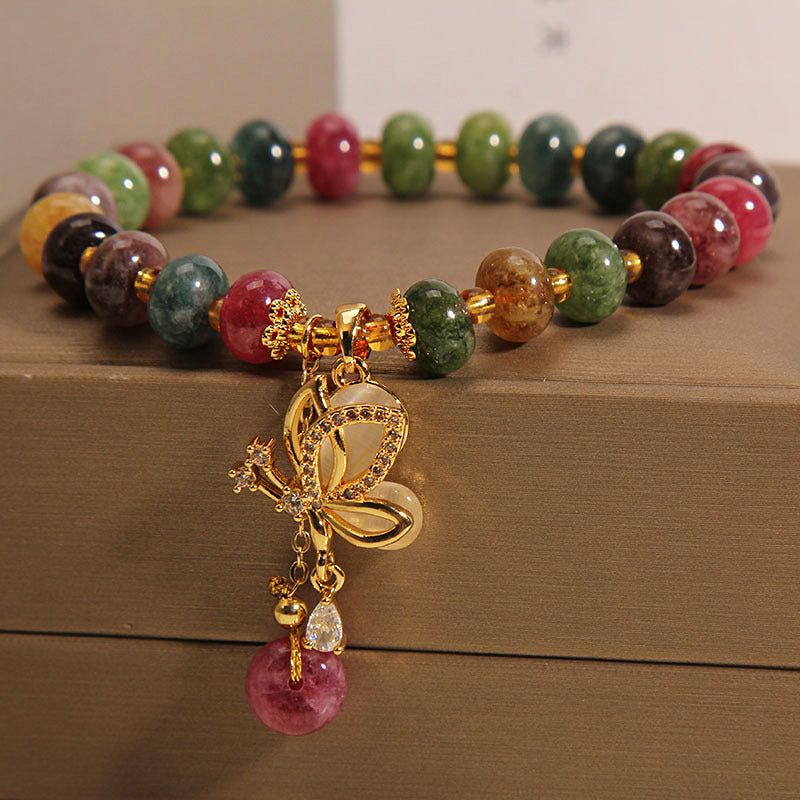 Pulsera de sabiduría con dije de mariposa y turmalina colorida con Buddha Stones