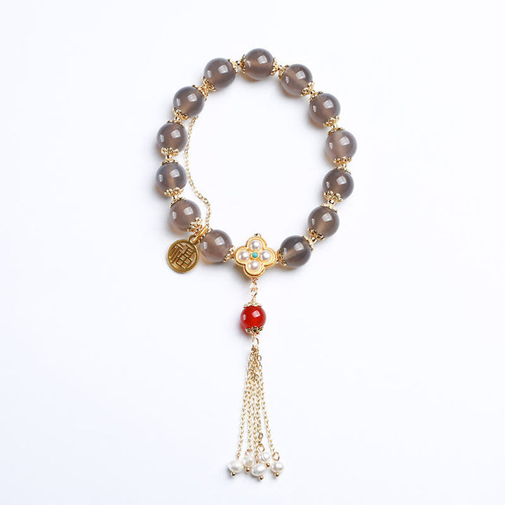 Pulsera de equilibrio con borlas y perlas de carácter Fu de ágata gris natural con Buddha Stones