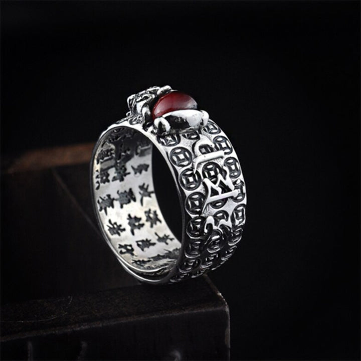 Anillo de riqueza de granate rojo FengShui PiXiu con Buddha Stones