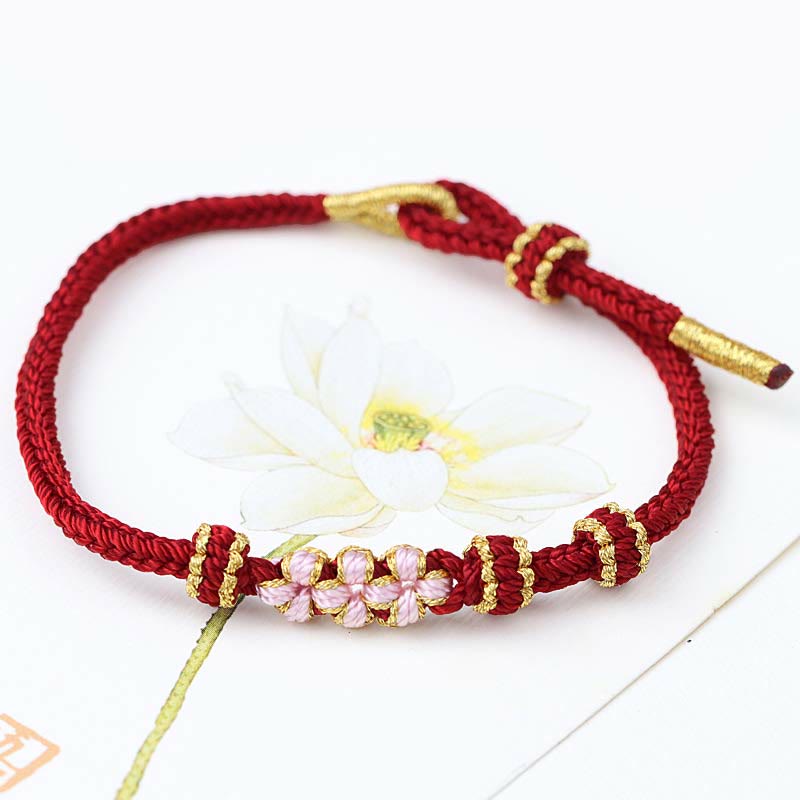 Pulsera de cuerda trenzada de ocho hebras de la suerte con tres flores de melocotón hechas a mano con Buddha Stones