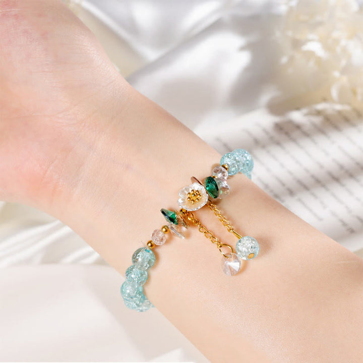 Pulsera de cuentas de cristal con dije de flor de diseño simple con Buddha Stones