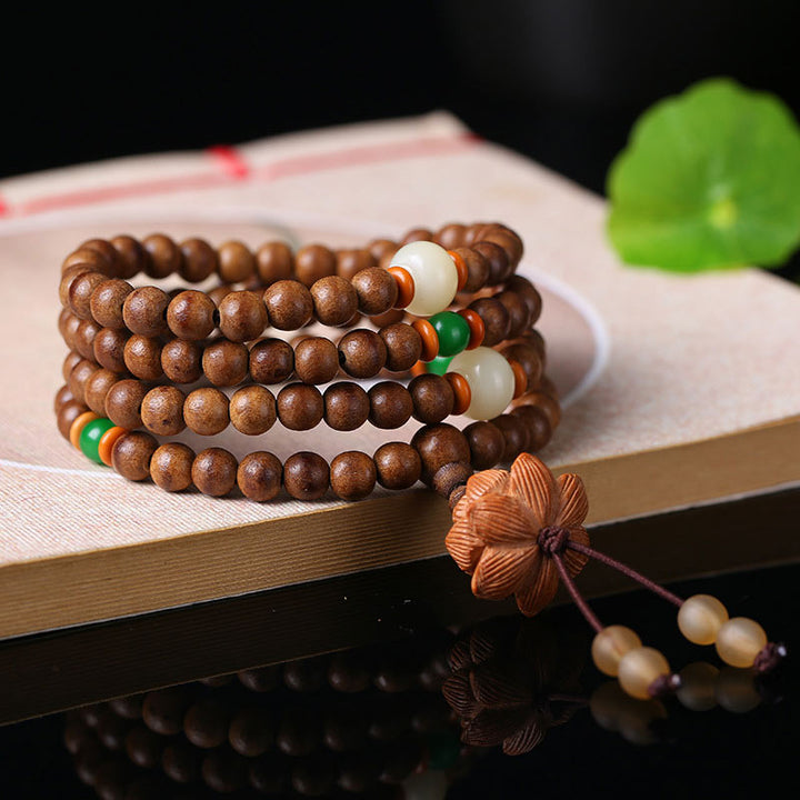 Buddha Stones 108 cuentas Mala madera de melocotón semilla Bodhi pulsera de meditación de oración de loto