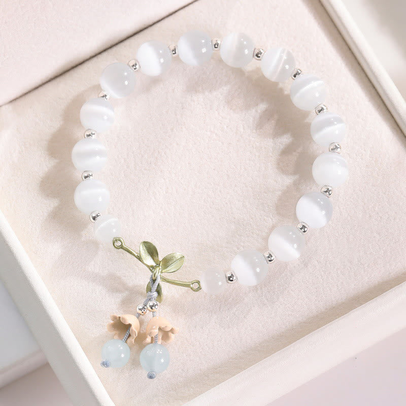 Pulsera con dije de orquídea de la paz, cristal rosa, calcedonia azul, aventurina verde, ojo de gato , Buddha Stones
