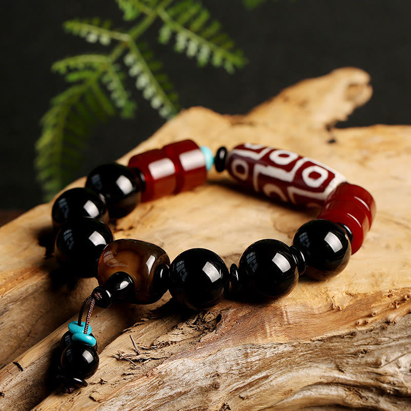 Pulsera tibetana de protección de la riqueza de ónix negro con cuentas Dzi de nueve ojos