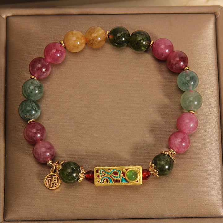 Pulsera con dije de personaje Fu positivo de turmalina colorida con Buddha Stones