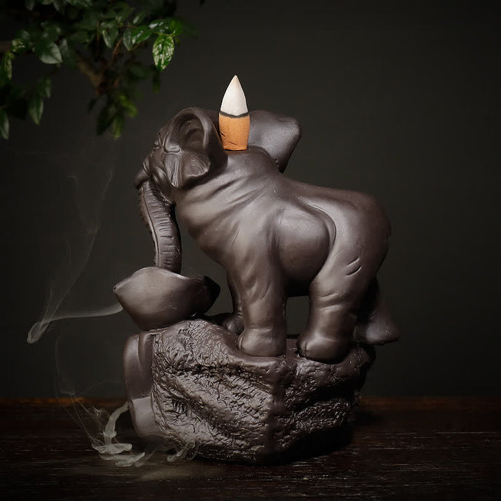 Elefante tibetano, fuente de humo de reflujo de arcilla púrpura, decoración de quemador de incienso curativo de paz