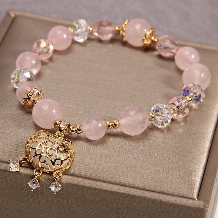 Pulsera de protección calmante de cristal rosa natural con Buddha Stones