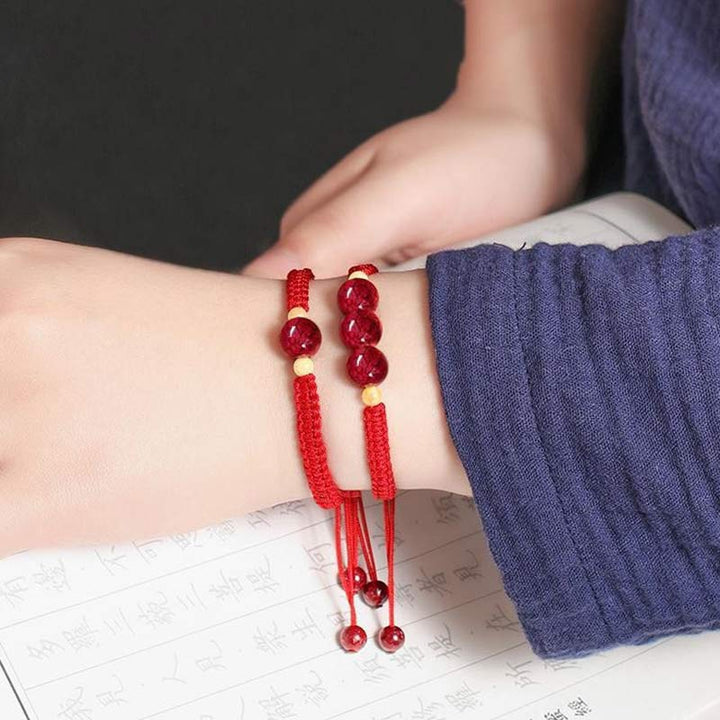 Pulsera de hilo rojo con bendición de cinabrio de Buddha Stones para niños