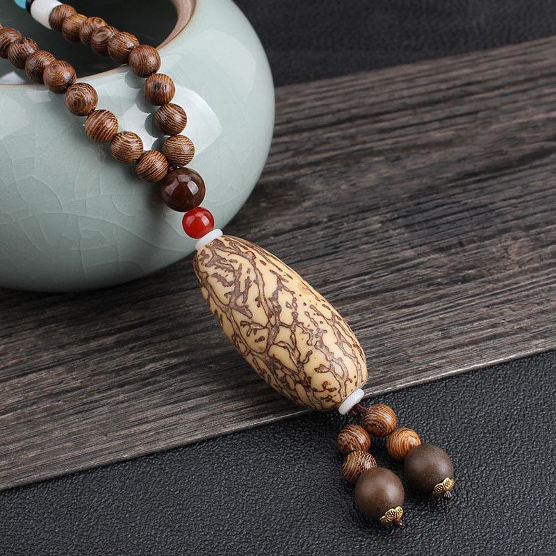 Buddha Stones, colgante de collar de paz de equilibrio de ágata de semilla Bodhi de madera de wengué tibetano